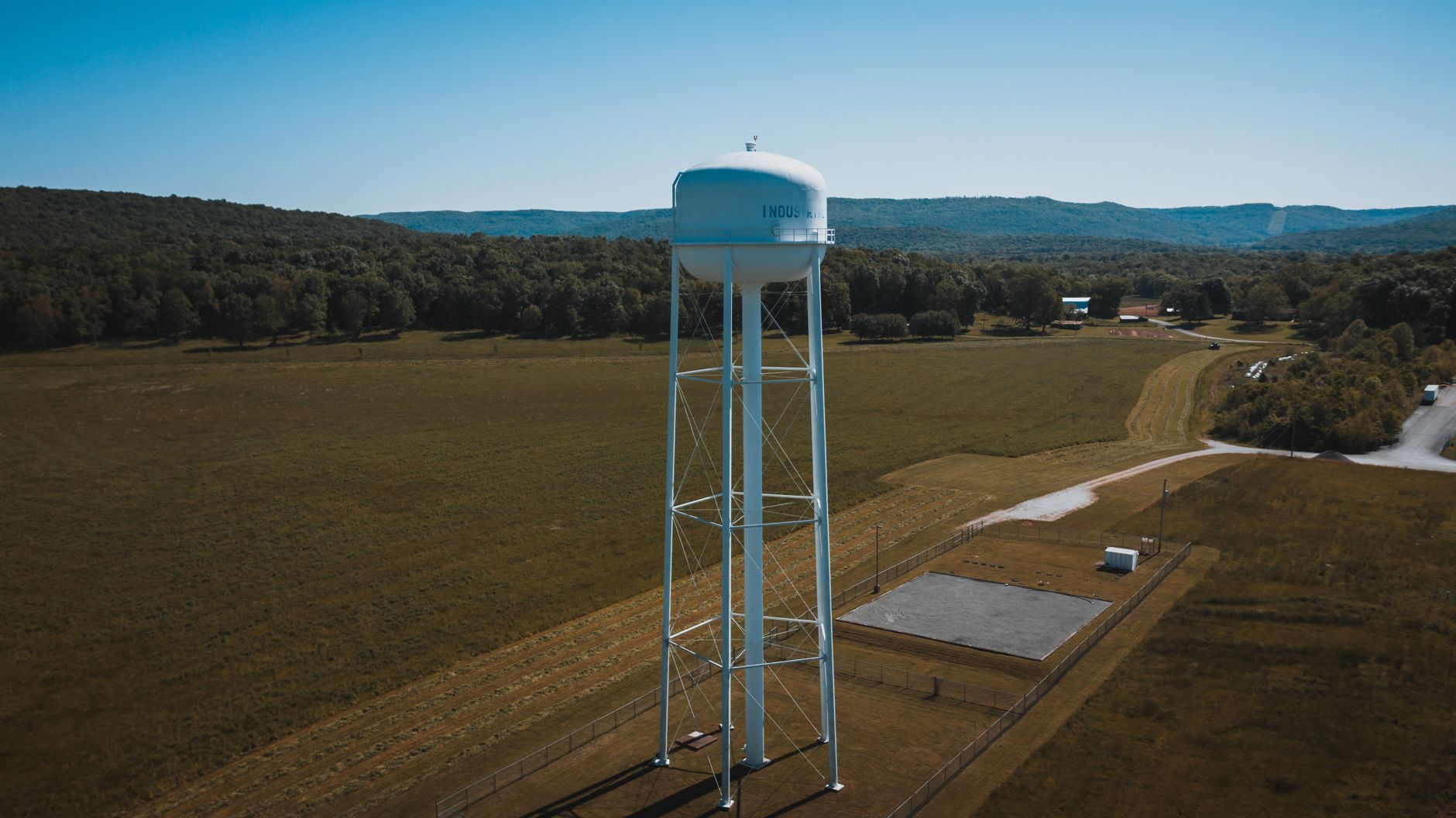 Large water storage tanks at an off-grid homestead
